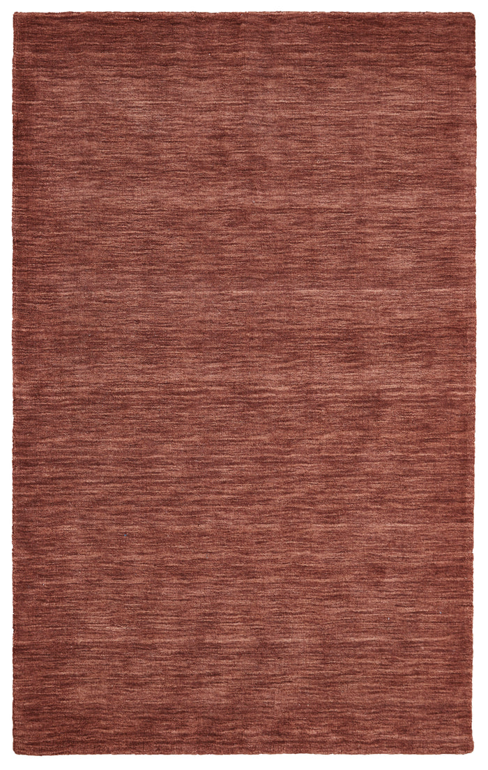 Rust colored rug that has a beautiful phantom depth effect - Santa Clara Furniture store