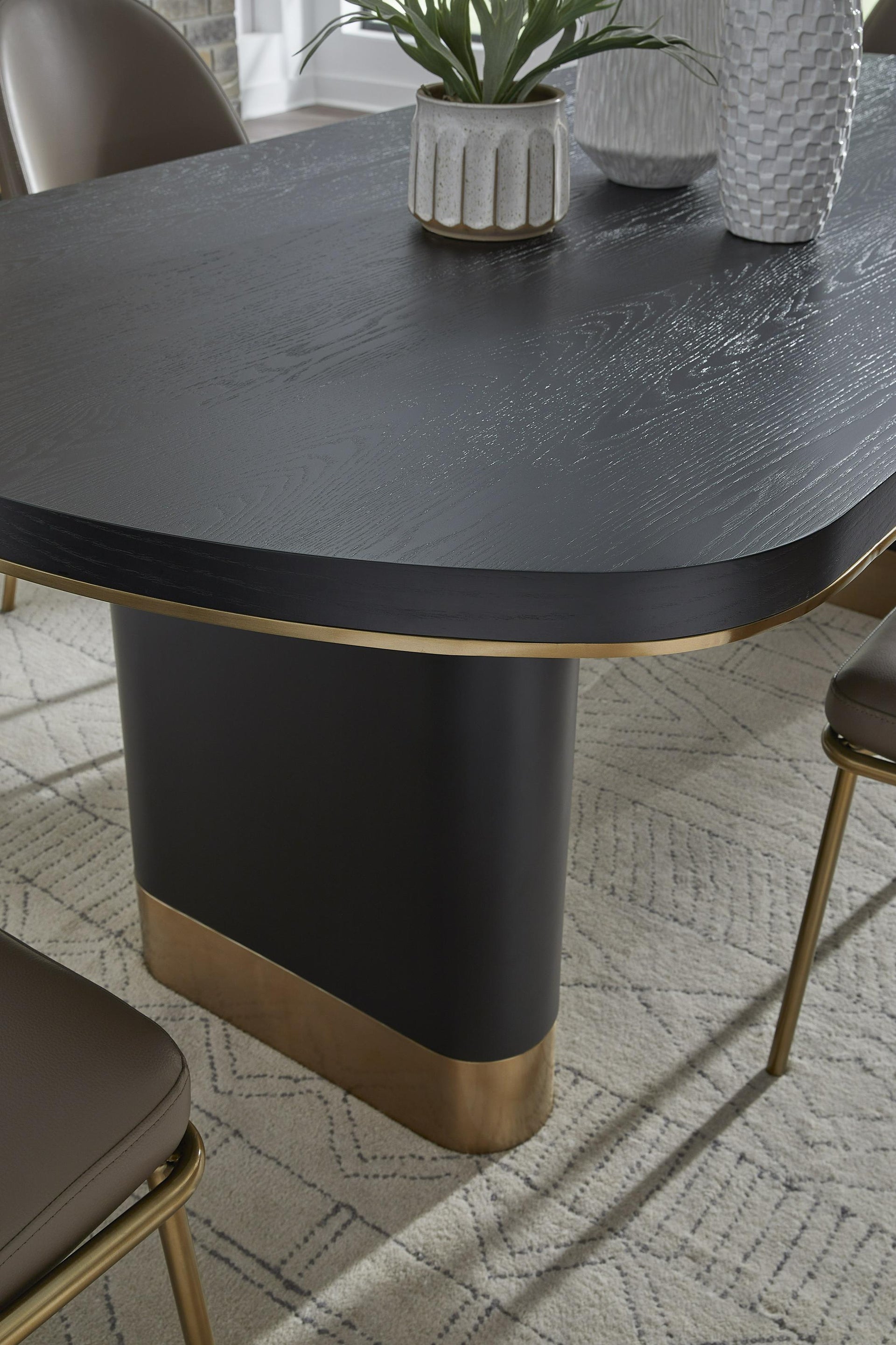 Doheny Wood and Metal Oval Dining Table in Black and Brass - What A Room