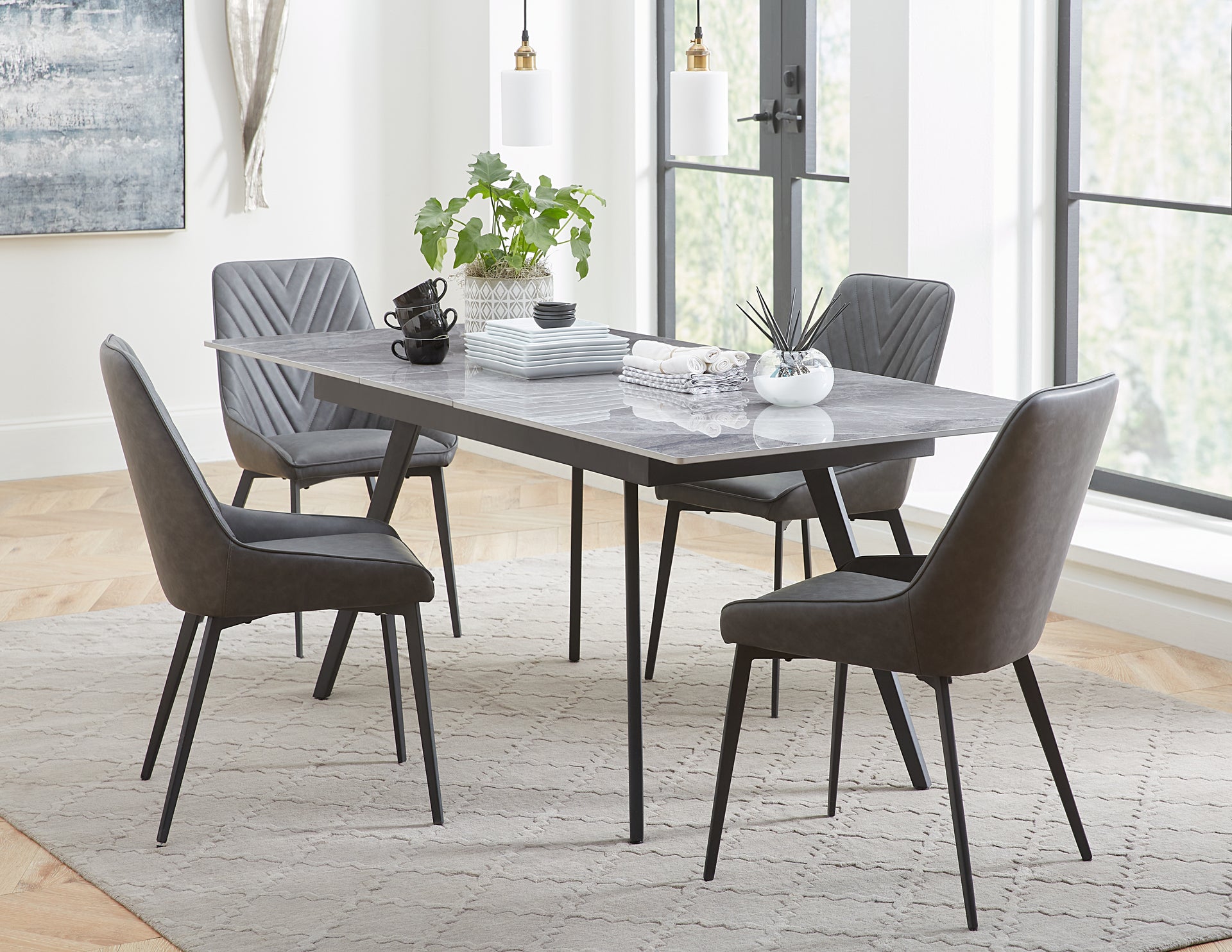 Lucia Extendable Stone Top Metal Leg Dining Table in Piedra and Black - What A Room