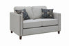 Coltrane Upholstered Loveseat with Nailhead Trim Putty - What A Room