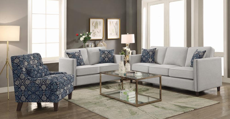 Coltrane Upholstered Loveseat with Nailhead Trim Putty - What A Room