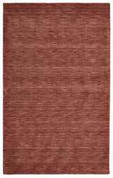 Rust colored rug that has a beautiful phantom depth effect - Santa Clara Furniture store