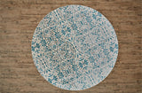 Beautiful turquoise and natural colored circular rug with ornate design motif - Furniture store is in Santa Clara, but ships nationally