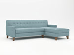 Light blue L-Shaped chaise with wooden legs