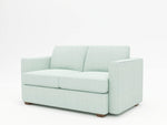 Lovely light blueish hued upholstery on a fully customized loveseat