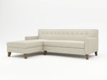Oatmeal colored chaise sofa with wood feet