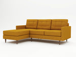 A medium yellow colored upholstery on a custom chaise sofa