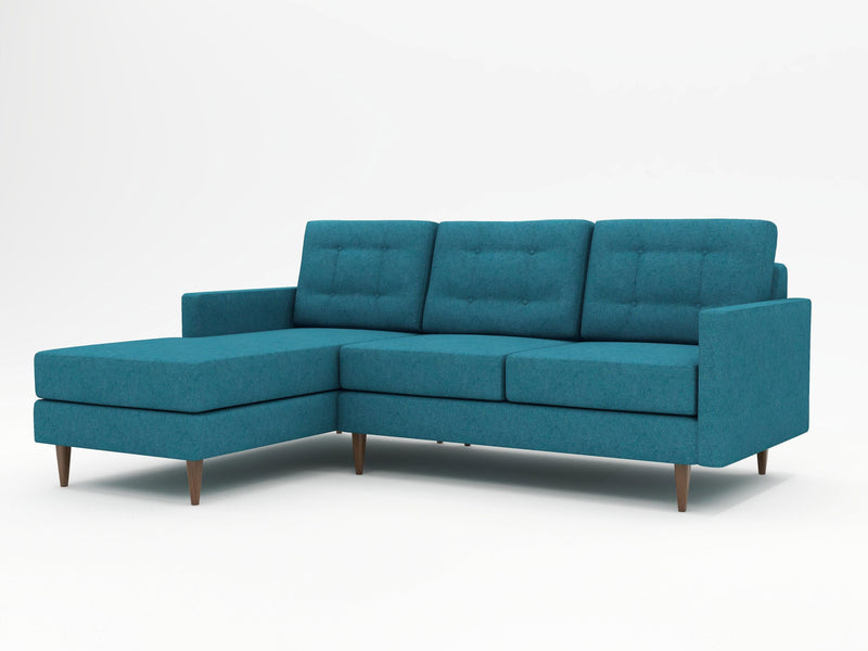 A high profile sofa with a chaise return on the left side as you view it